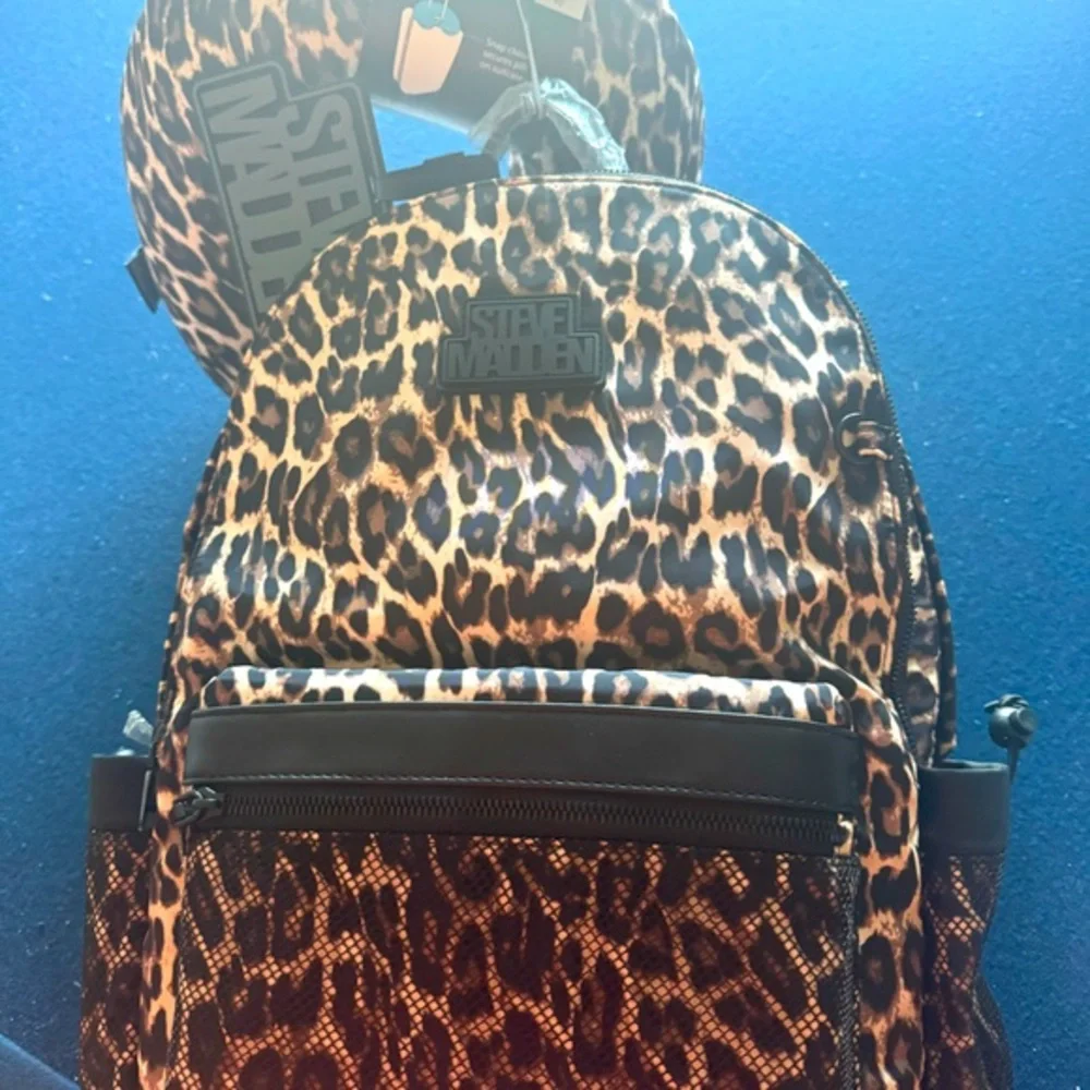 STEVE MADDEN cheetah backpack,neck pillow & luggage tag! 🤎🖤Travel in style 🖤🤎